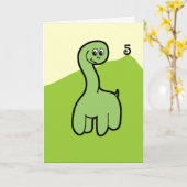 緑恐竜カードを牧草を食べる第5誕生日 カード (黄色い花)