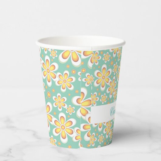 緑色に可愛いオレンジ色の花をモノグラム 紙コップ (右)