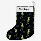 緑色のおもしろいカエルの飛び鳥 スモールクリスマスストッキング (裏面)