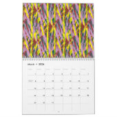 緑色の目をした毛むくじゃらの灰色の猫が窓に座っている カレンダー (3月 2026)