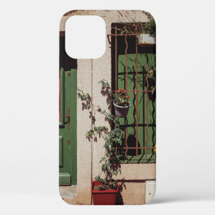 緑色植物付き緑色木製扉 iPhone 12ケース