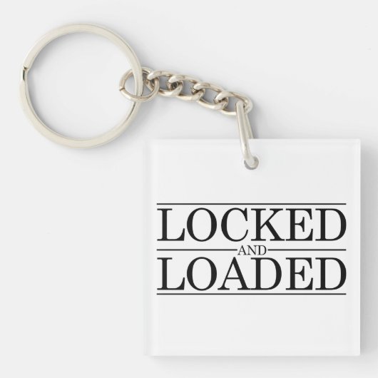 締められ、荷を積まれた純潔のデザイン キーホルダー (正面)