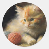 編み糸でオレンジ遊色の子猫を起こす ラウンドシール (正面)