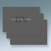 編集可能なビジネス名(またはその他の文字)グレー ラッピングペーパーシート