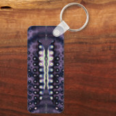 繊細な翼 – キーチェーン (裏面)