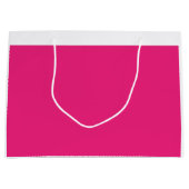 繊細な赤いバラの花びらに囲まれた鮮やかな赤いバラ ラージペーパーバッグ (正面)