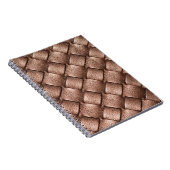 織革、ブロンズ色の背景。 ノートブック (右側)