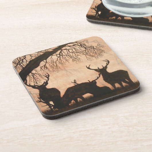 置かれるアカシカの雄鹿のコースター コースター (左側)
