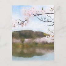 美しいさくらんぼの花と池