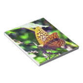 美しいオレンジと黒の斑点のある蝶 ノートパッド (アングル)