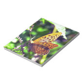 美しいオレンジと黒の斑点のある蝶 ノートパッド (回転)