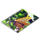 美しいオレンジと黒の斑点のある蝶 ノートブック (左側)