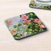 美しいピンクの赤い白いバラの水色のフローラ コースター (左側)