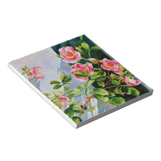 美しいピンクの赤い白いバラの水色のフローラ ノートパッド (アングル)