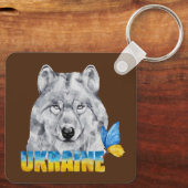 美しい水色ウクライナウルフと蝶 キーホルダー (裏面)