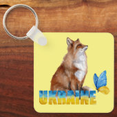 美しい水色ウクライナキツネと蝶 キーホルダー (正面)