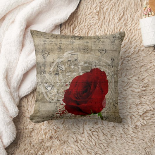 美しい赤いバラの音楽のノートは色あせたピアノを渦巻く クッション (ブランケット)