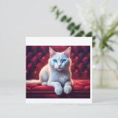 美しい青い目をしたアルビノ猫がエキゾチックな赤いソファに座っている 招待状 (スタンド正面)