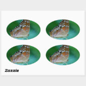 美しいDanaus Plexippus葉に蝶。 楕円形シール (シート)