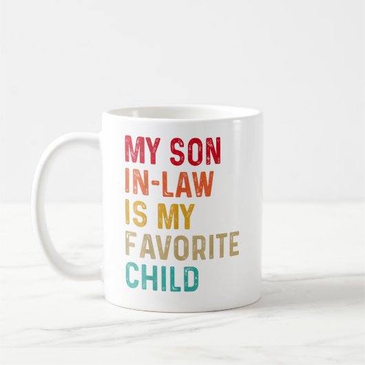 義理の息子は子お気に入りの家おもしろいだ コーヒーマグカップ (左)