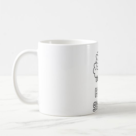 羽と光輪のついたユーモラスな聖なる羊 コーヒーマグカップ (左)