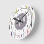 羽と矢モノグラム ラウンド壁時計 (傾斜)