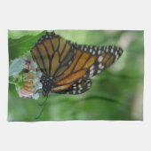 羽ばたくオオカズラチョウ ピンクと白の花 キッチンタオル (横)