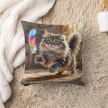 羽を追いかけるかわいい毛ふわふわした猫