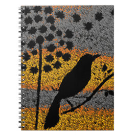 羽毛の螺旋状手帳の間の鳥 ノートブック