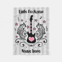 翼が付いているピンクのロックスターのギター