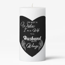 翼のある夫の妻だ