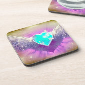 翼の生えた青いハート コースター (左側)