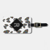 翼を持つ蝶の群カラフルれストライプの ラゲッジタグ (正面横)