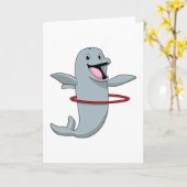 耐久性トレーニング中のイルカとフィットネスタイヤ カード (黄色い花)