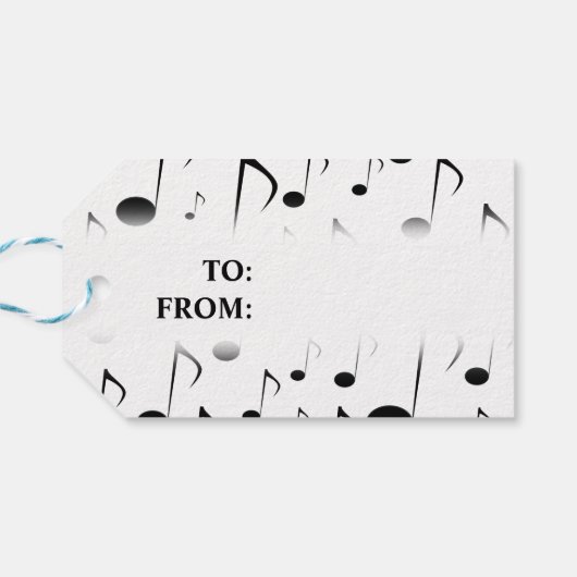 「聖降誕祭お目出とう!」;多くの楽譜パターン ギフトタグ (裏面横)