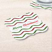 「聖降誕祭お目出とう！」赤と緑の波線パターン ペーパーコースター (アングル)