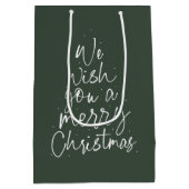 聖降誕祭のお祝いを楽しんでおもしろい ミディアムペーパーバッグ (裏面)