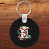 聖降誕祭の帽子に本が入った犬 – 完璧なキリスト キーホルダー (正面)