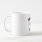 肘を上げろ!カナダ コーヒーマグカップ (左)