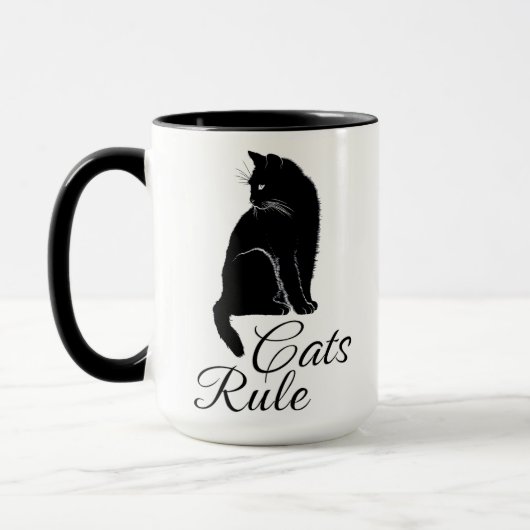 背中に美しい座り猫 – Cats Rule マグカップ (左)