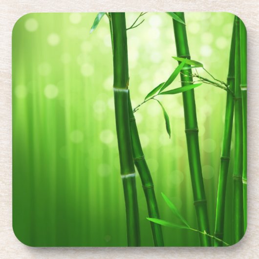 背中に《写真》ぼけ味淡い色の灯を付けた緑の竹 コースター (正面)