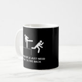 背中を軽くたたく人もいる コーヒーマグカップ (正面左)