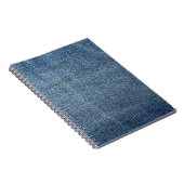 背景に対する粗末なデニムのテクスチャ。ブルージーンズ ノートブック (右側)