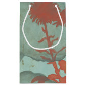 背景に赤い花のシルエットティール(緑がかった色) スモールペーパーバッグ (裏面)