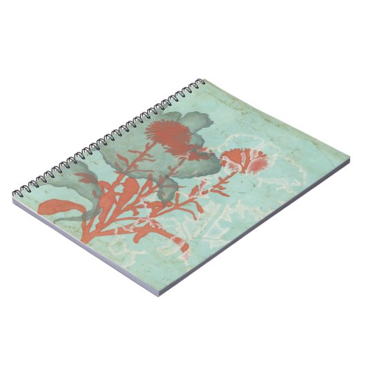 背景に赤い花のシルエットティール（緑がかった色） ノートブック (左側)