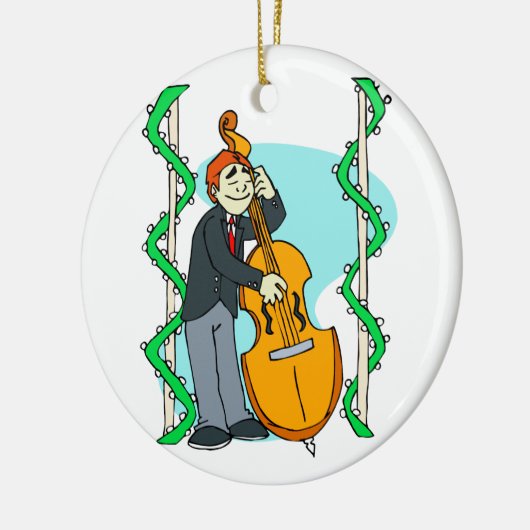 背景幕によって直立した低音を遊んでいる漫画の人 セラミックオーナメント (左)