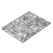 背景100ドル紙幣。 ノートブック (左側)