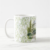 胸にウサギ 緑の葉の花 コーヒーマグカップ (左)