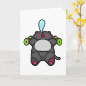 胸の前でダンベルを使って猫がトレーニングしている カード (黄色い花)