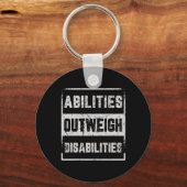 能力は障害を上回る自閉症意識D キーホルダー (裏面)